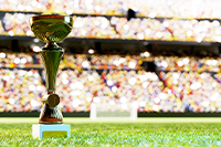 Photographie d'une coupe dans un stade de football, prise en contre-plongée.